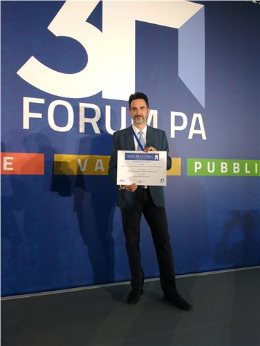 Paolo Dongilli della Sovrintendenza riceve il premio per il progetto FUSS Foto USP